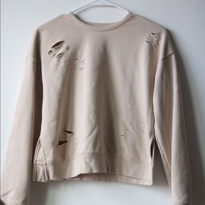 Cropped distressed sweater